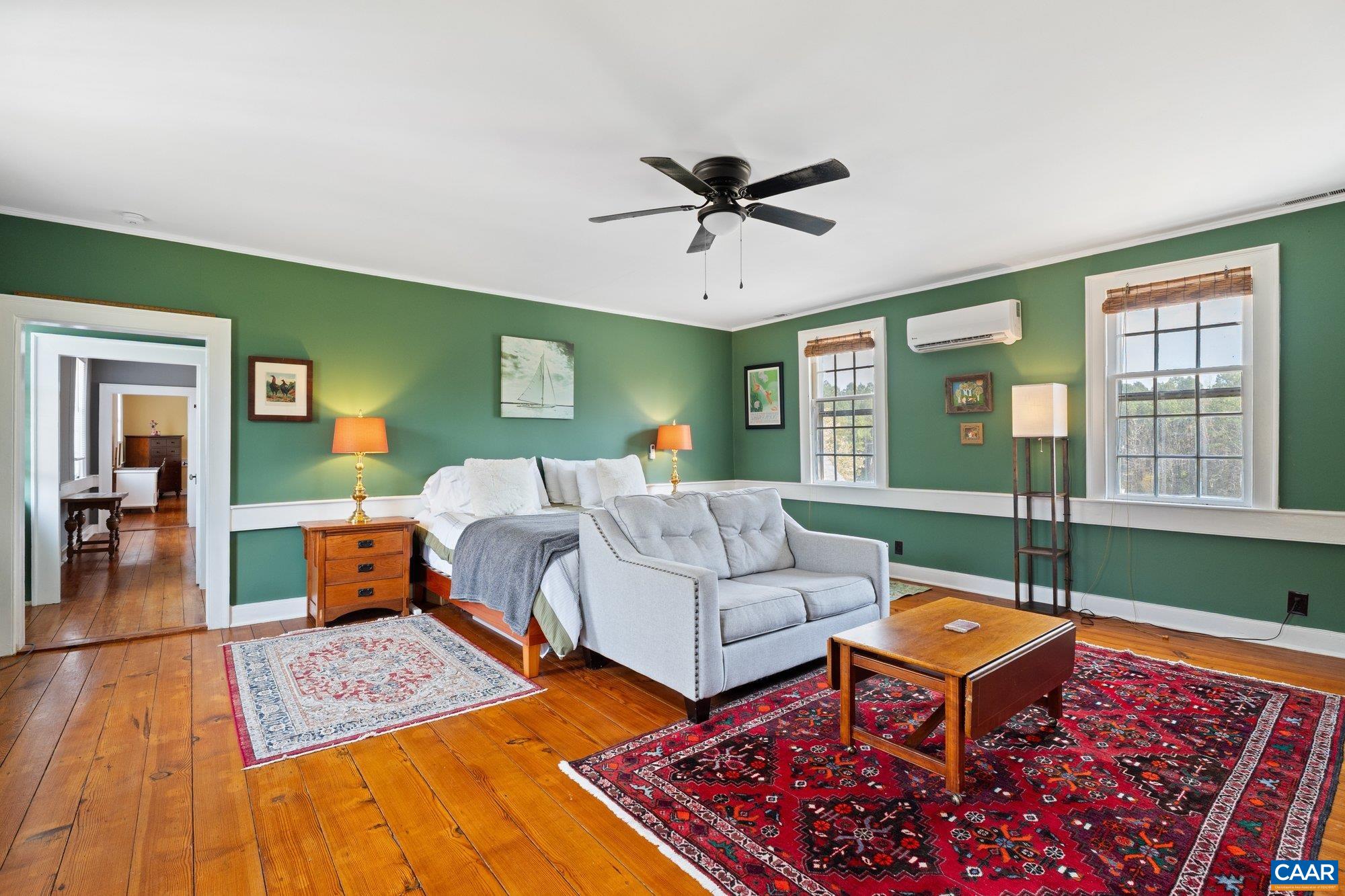 14910 Western Mill Road Lawrenceville, VA 23868 - Photo 38 of 73 a living room with furniture a rug and a window