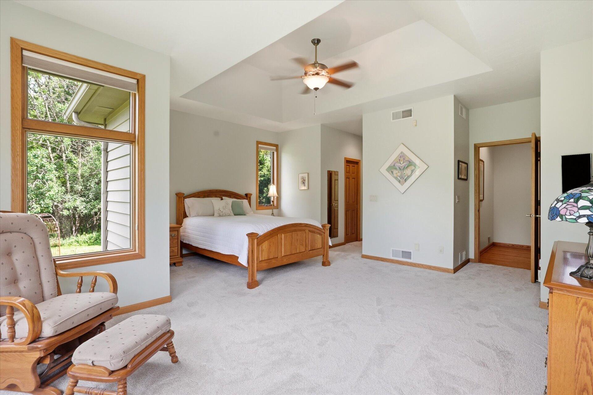 W330-s1417 County Rd C Delafield, WI 53018 - Photo 16 of 39 Brand new carpet, tray ceiling, WICs, & private bath