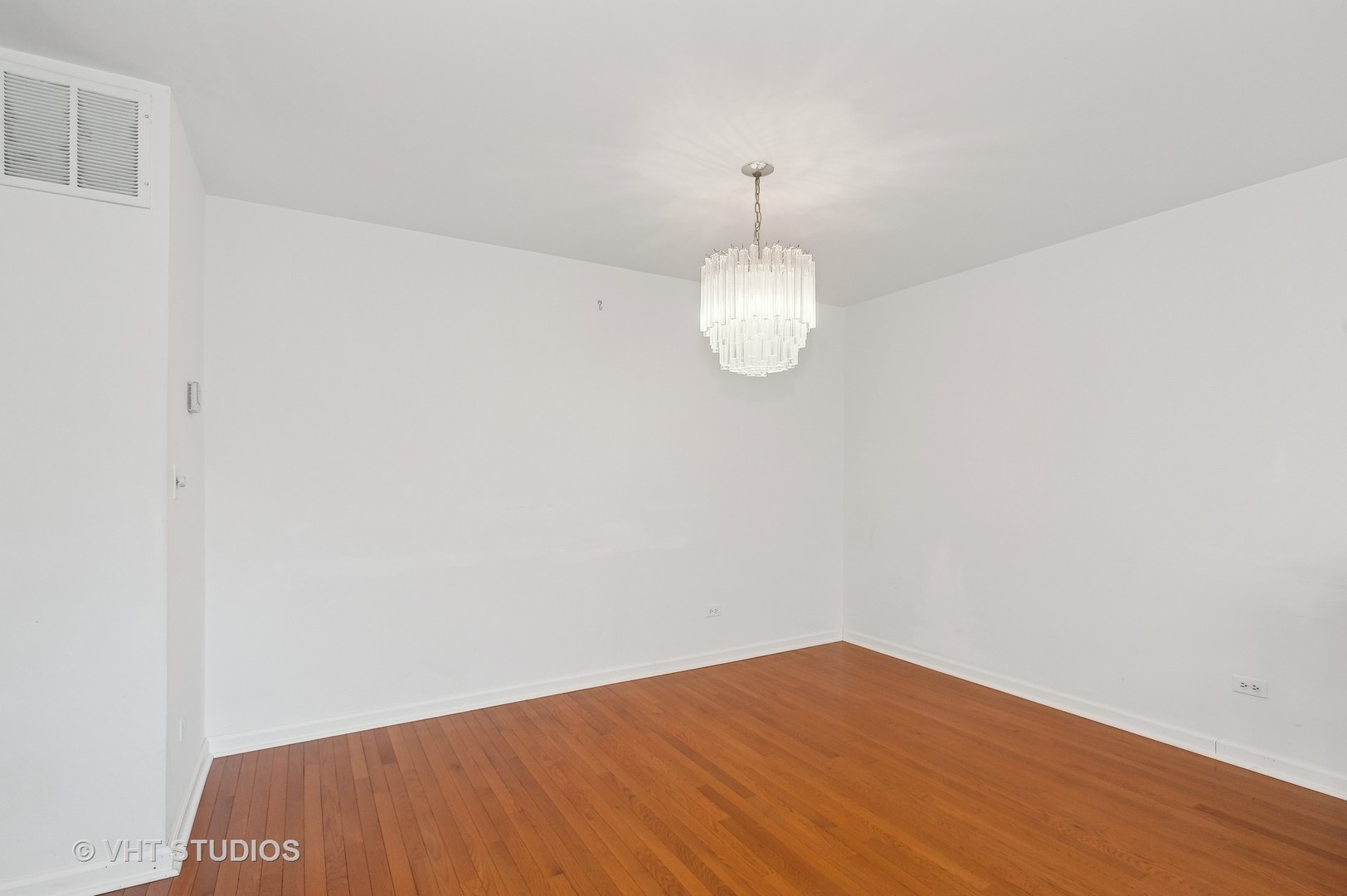 307 Pin Oak Drive Wilmette, IL 60091 - Photo 6 of 18 a view of empty room with wooden floor