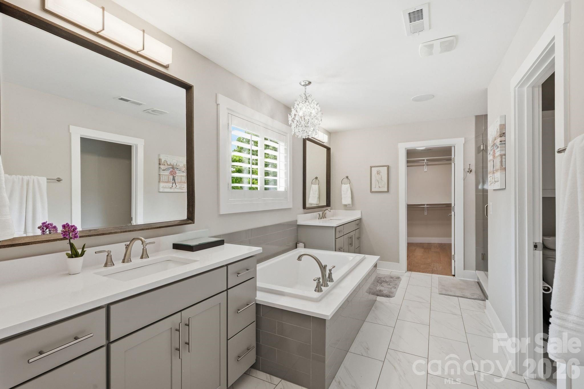 1086 Weir Court Fort Mill, SC 29708 - Photo 23 of 40 a bathroom with a sink and a mirror
