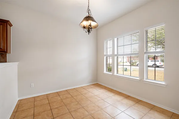 a view of a room with windows