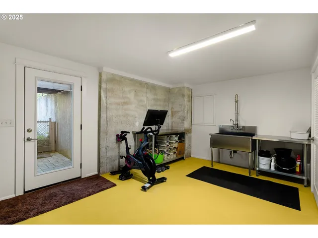 a living room with furniture flat screen tv and a view of living room