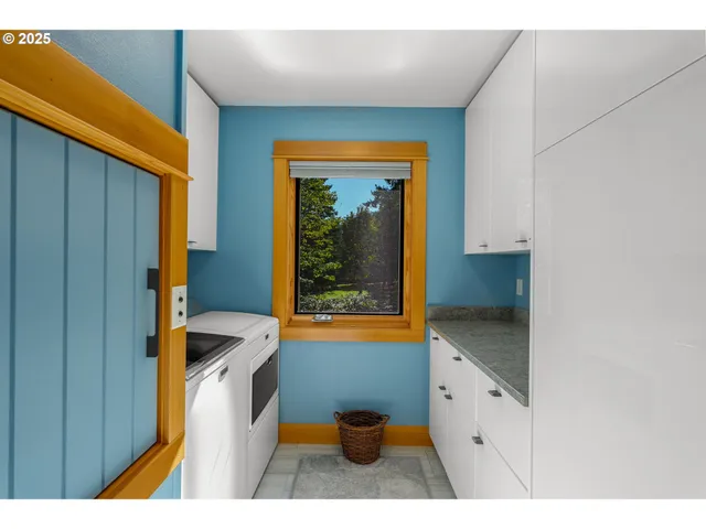 a view of a room with furniture window and hardwood