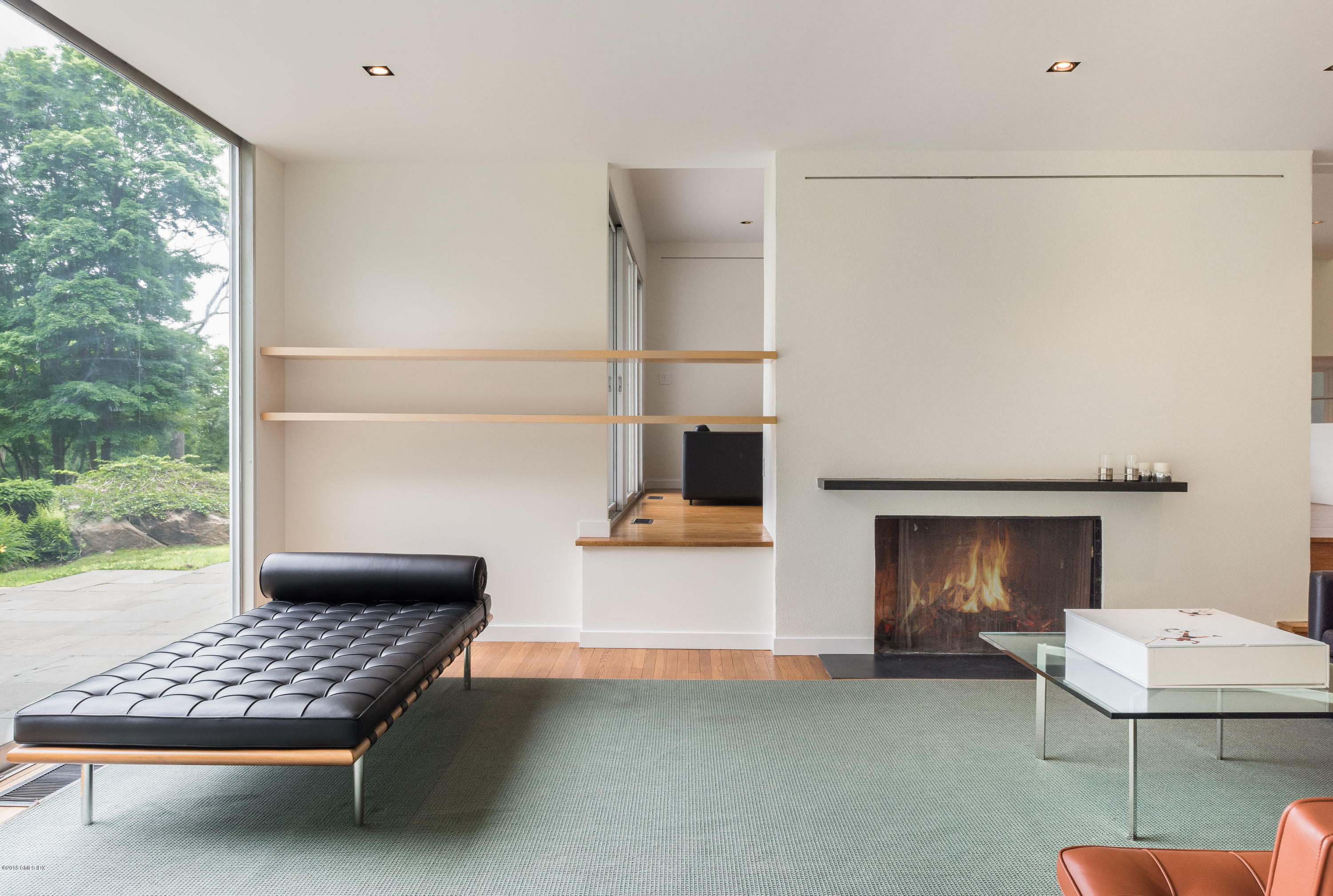 491 Riversville Road Greenwich, CT 06831 - Photo 14 of 30 a room with furniture and a fireplace