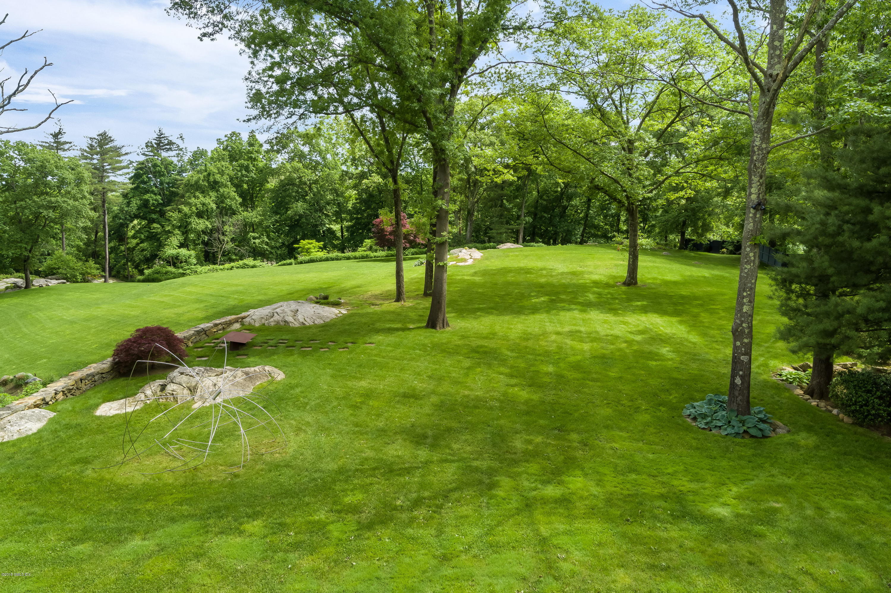 491 Riversville Road Greenwich, CT 06831 - Photo 6 of 30 a view of a park with a tree