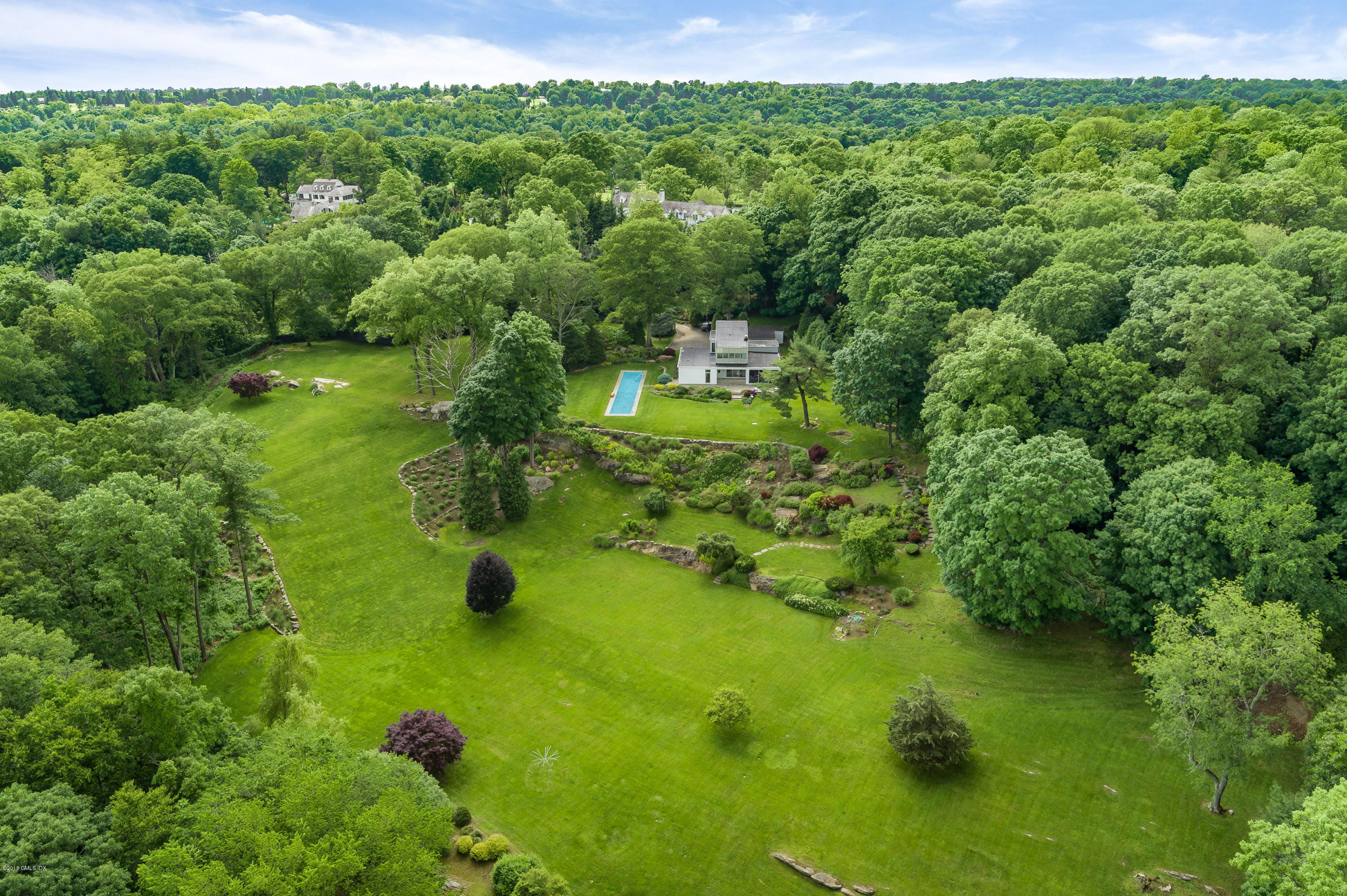 491 Riversville Road Greenwich, CT 06831 - Photo 9 of 30 a view of a garden with an outdoor space