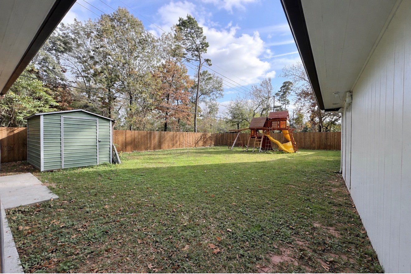 25910 Maplewood Drive Spring, TX 77386 - Photo 18 of 38 back yard with playground