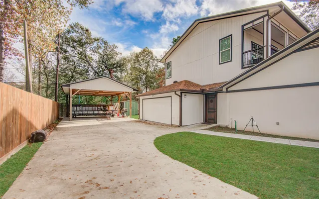 a bathroom with a shower and a sink