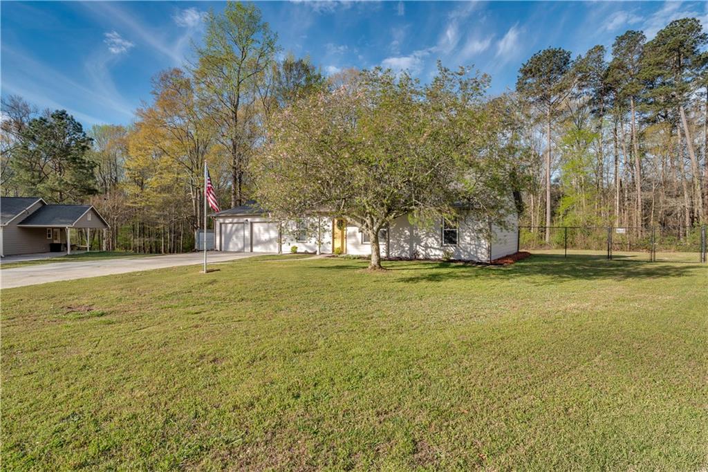 592 Linda Lane Powder Springs, GA 30127 - Photo 2 of 21 a view of yard and swimming pool