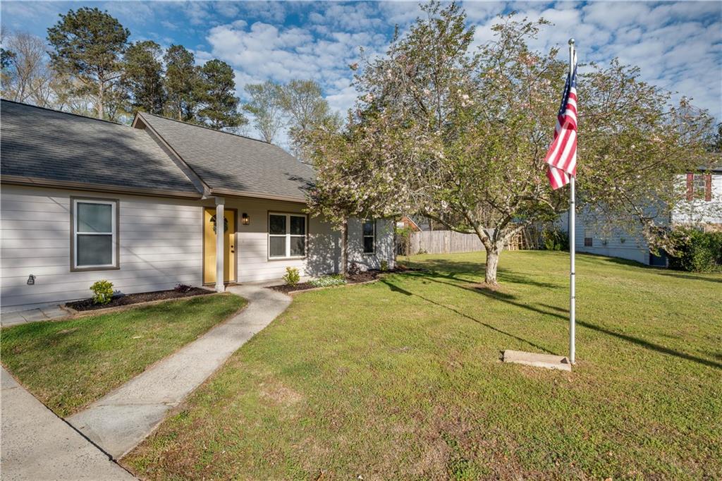 592 Linda Lane Powder Springs, GA 30127 - Photo 3 of 21 a house with trees in the background