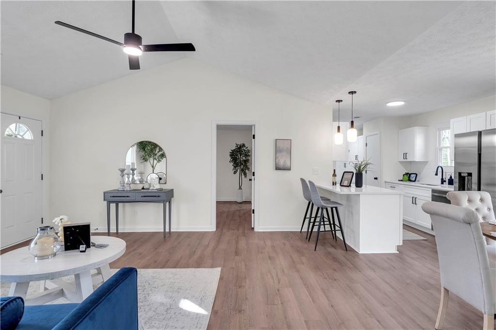592 Linda Lane Powder Springs, GA 30127 - Photo 6 of 21 a living room with furniture and a wooden floor