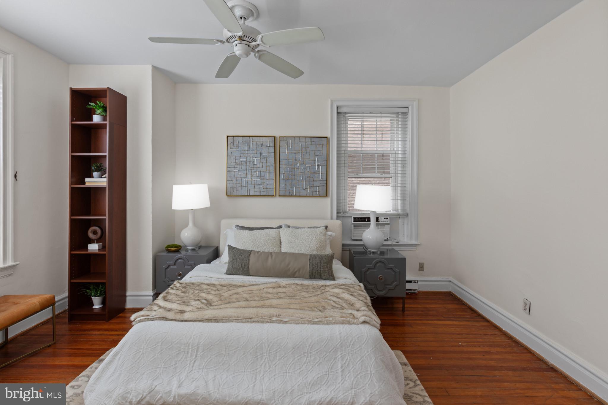 1332 15th Street Northwest, Unit 2 Washington, DC 20005 - Photo 20 of 28 a bedroom with a bed and a window