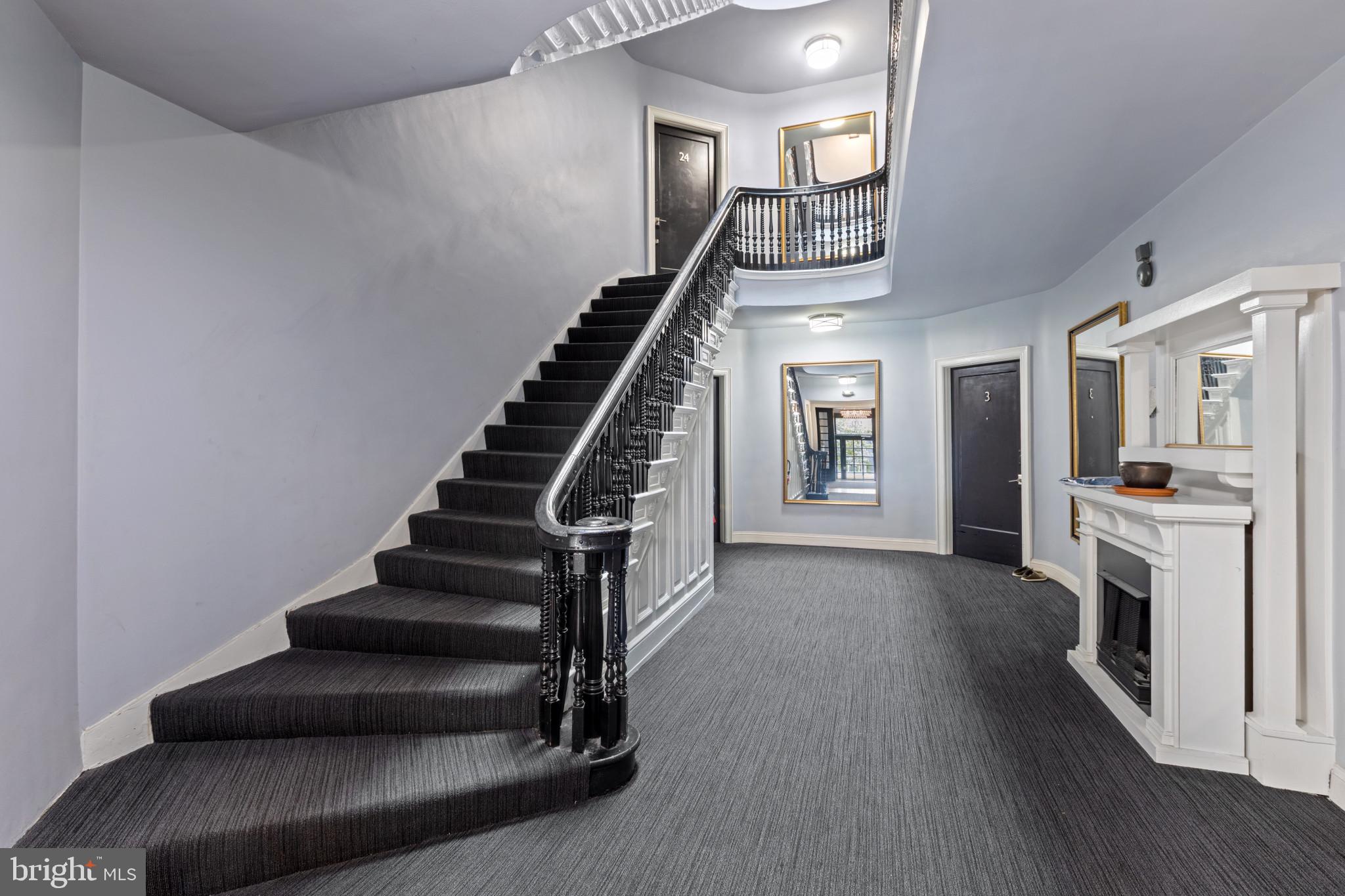 1332 15th Street Northwest, Unit 2 Washington, DC 20005 - Photo 25 of 28 a view of entryway and hall with wooden floor