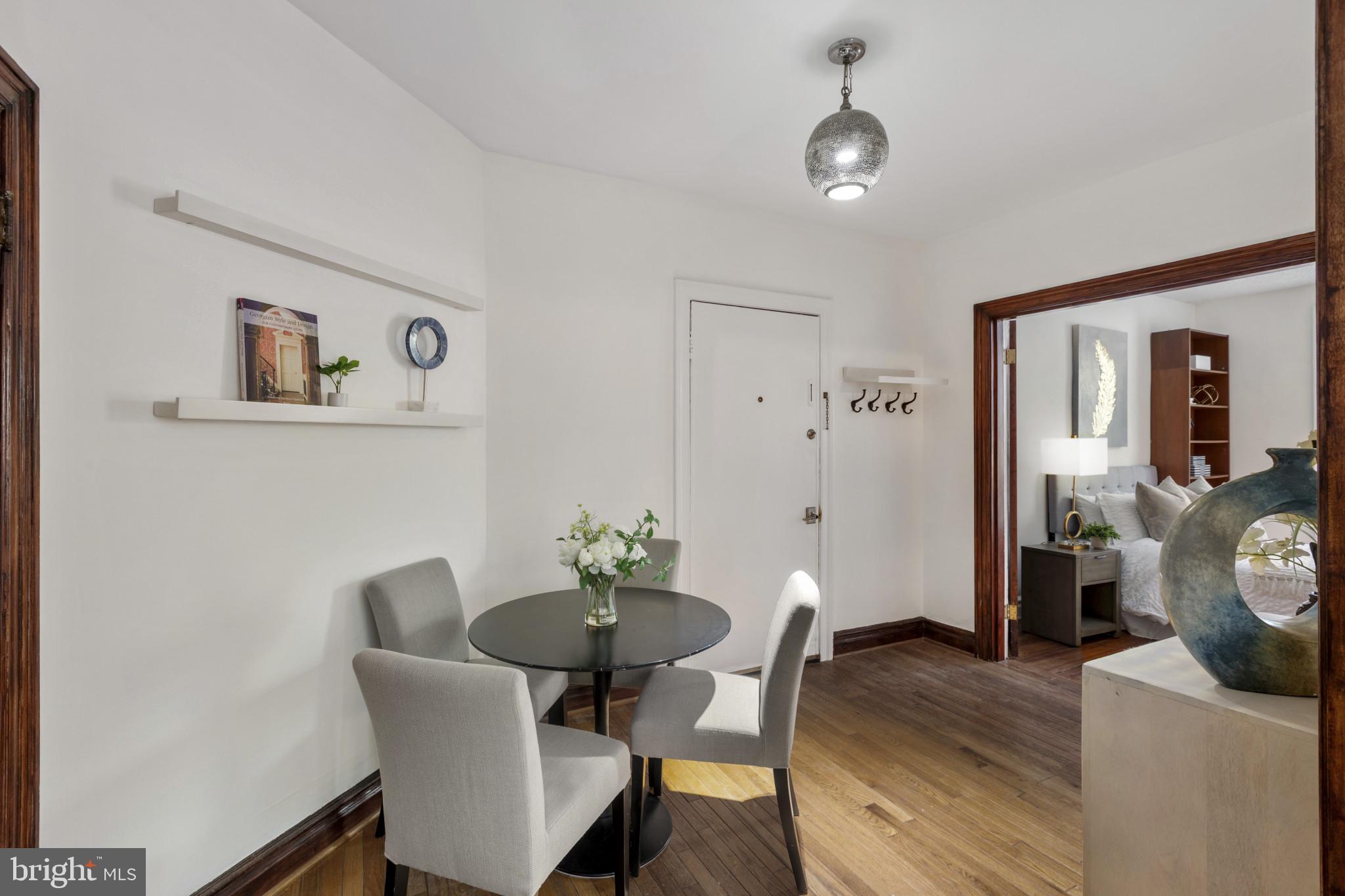 1332 15th Street Northwest, Unit 2 Washington, DC 20005 - Photo 4 of 28 a workspace with furniture and wooden floor