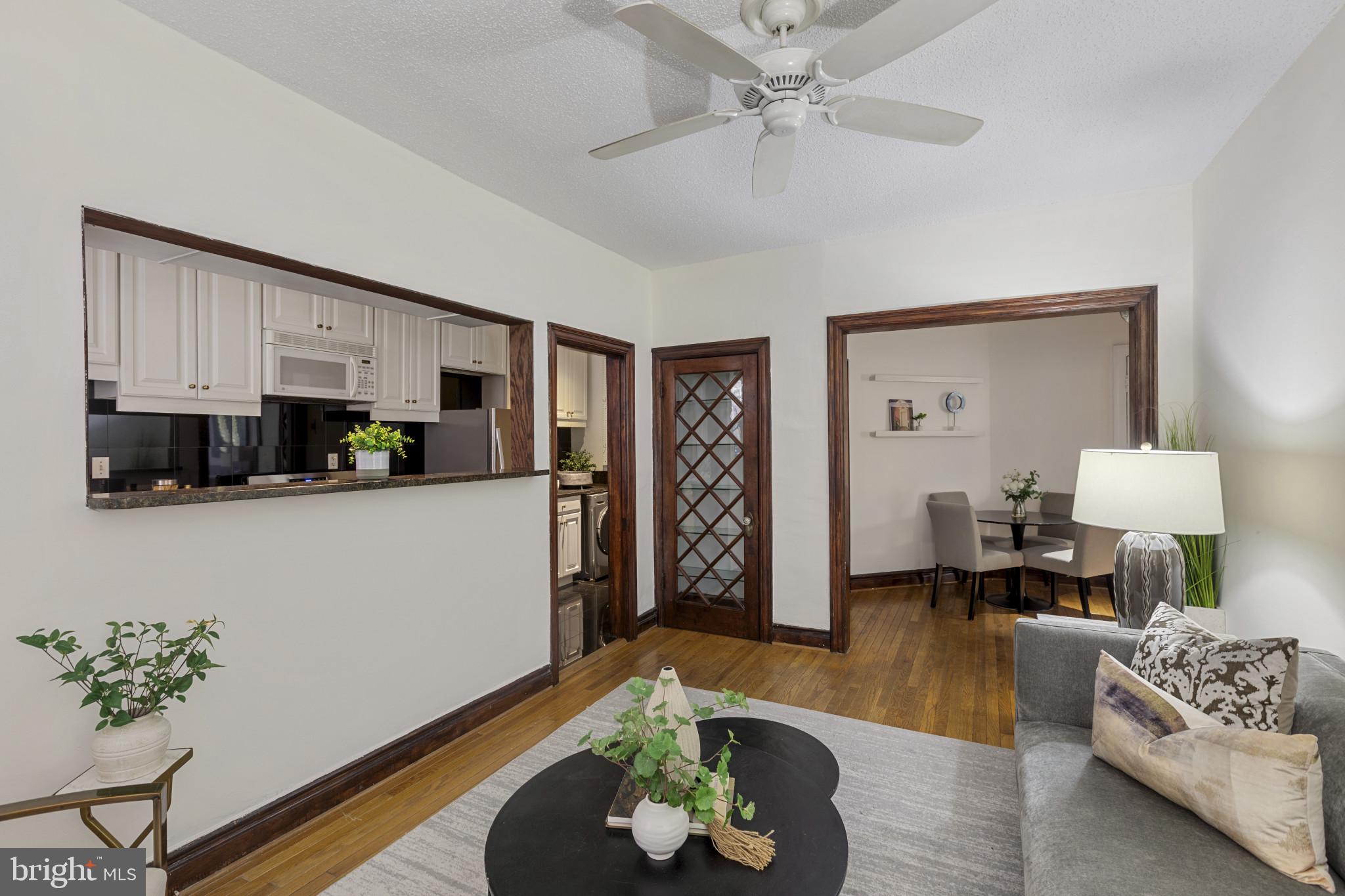 1332 15th Street Northwest, Unit 2 Washington, DC 20005 - Photo 8 of 28 a living room with furniture and a couch