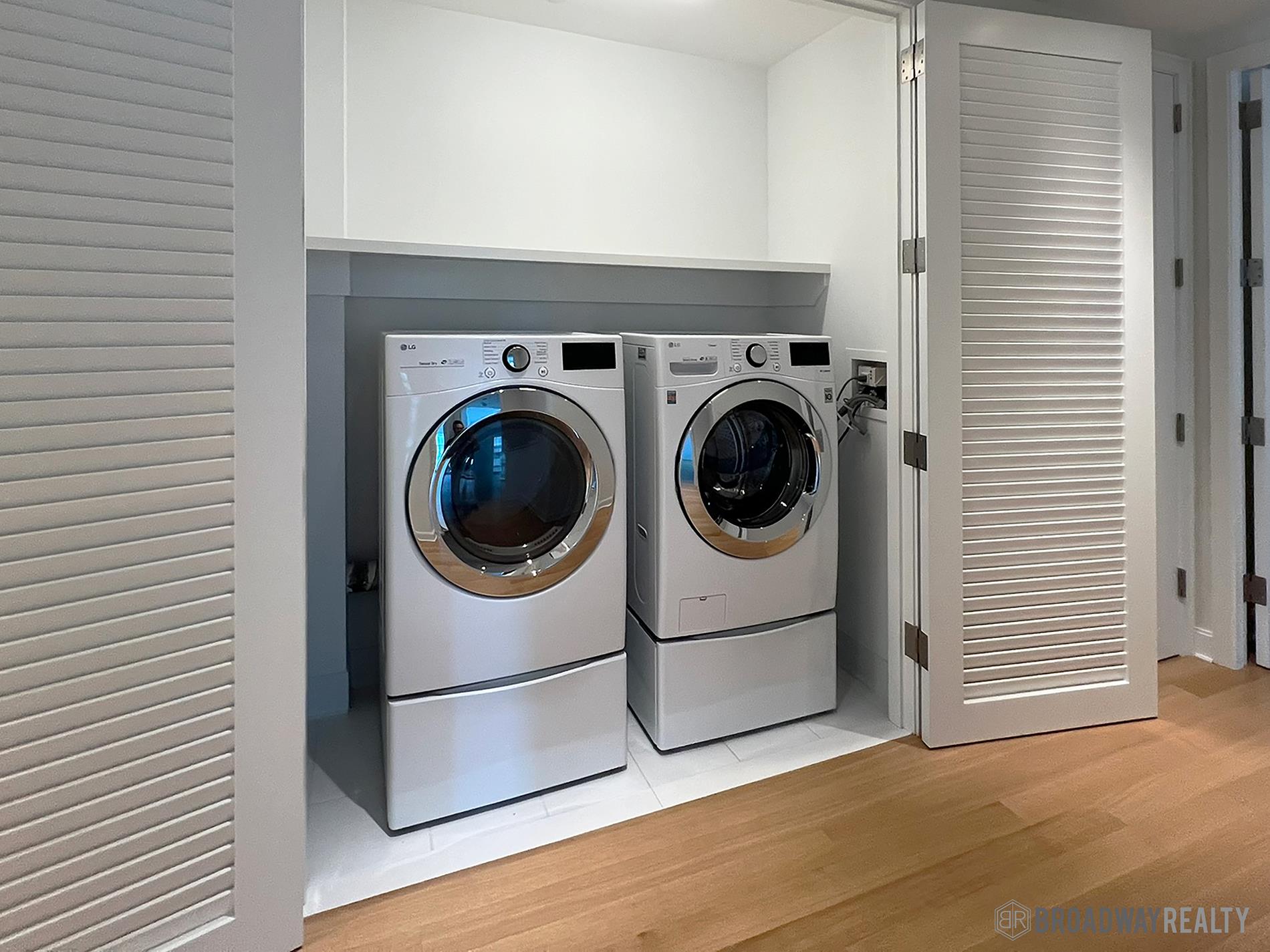 1289 Lexington Avenue, Unit 6B Manhattan, NY 10028 - Photo 19 of 24 a utility room with dryer and washer