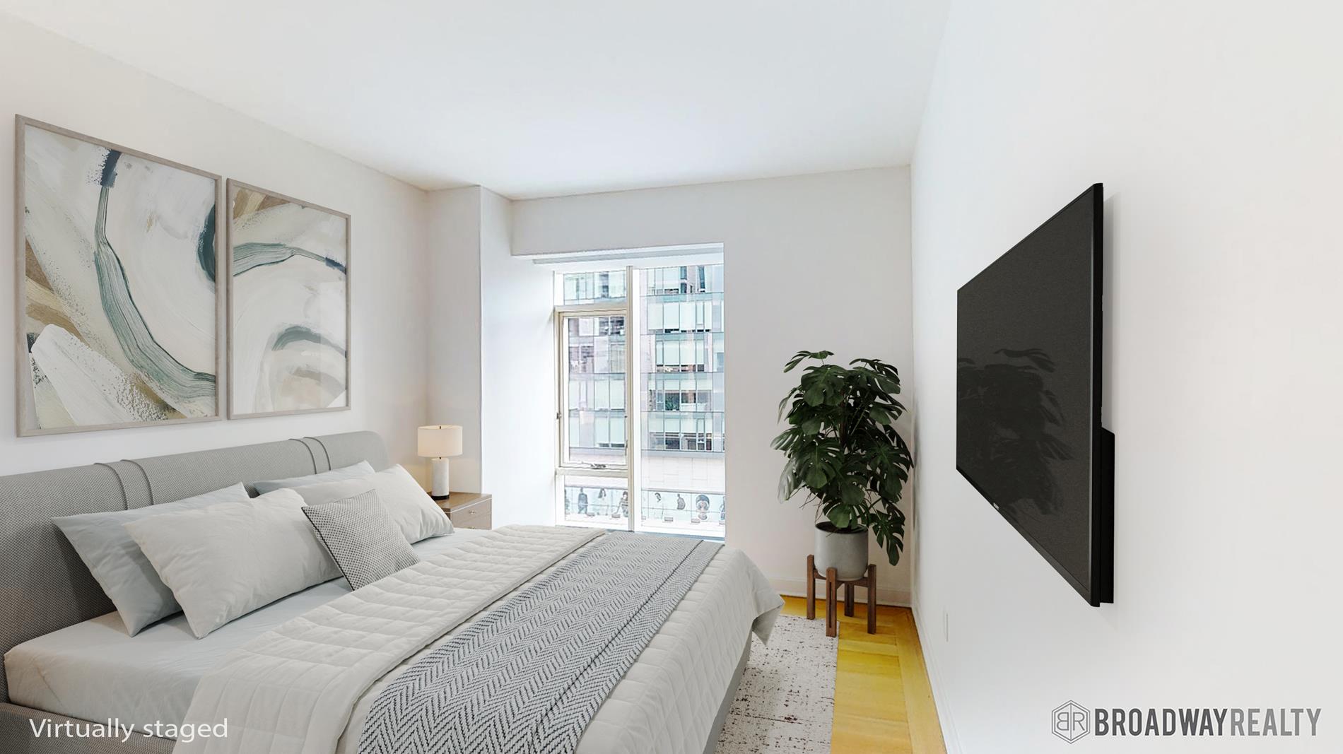 1289 Lexington Avenue, Unit 6B Manhattan, NY 10028 - Photo 6 of 24 a bed room with a bed window and a potted plant