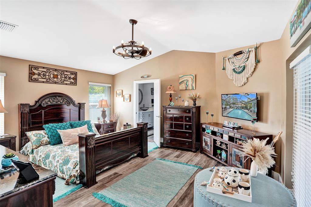 5076 Northwest 84th Road Coral Springs, FL 33067 - Photo 23 of 74 a living room with furniture and a flat screen tv