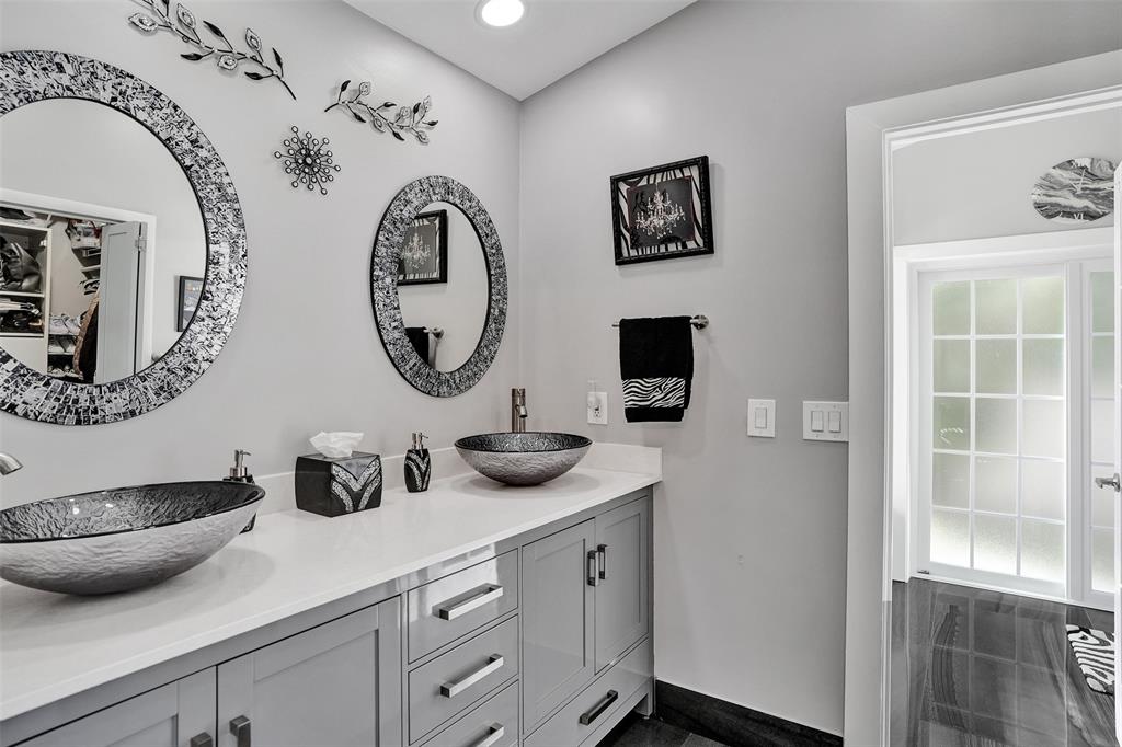 5076 Northwest 84th Road Coral Springs, FL 33067 - Photo 30 of 74 a bathroom with a toilet and a sink