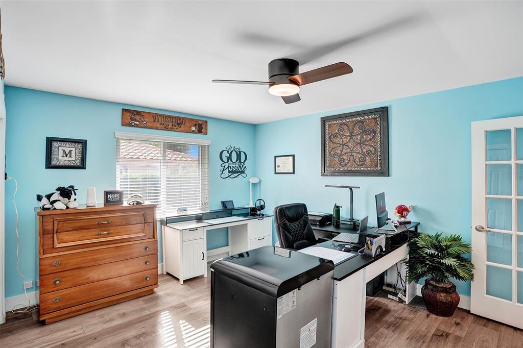 5076 Northwest 84th Road Coral Springs, FL 33067 - Photo 39 of 74 a room with furniture and window