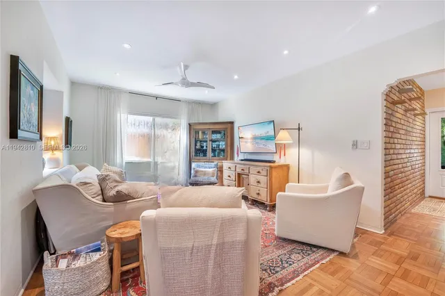 a patio with a table and chairs