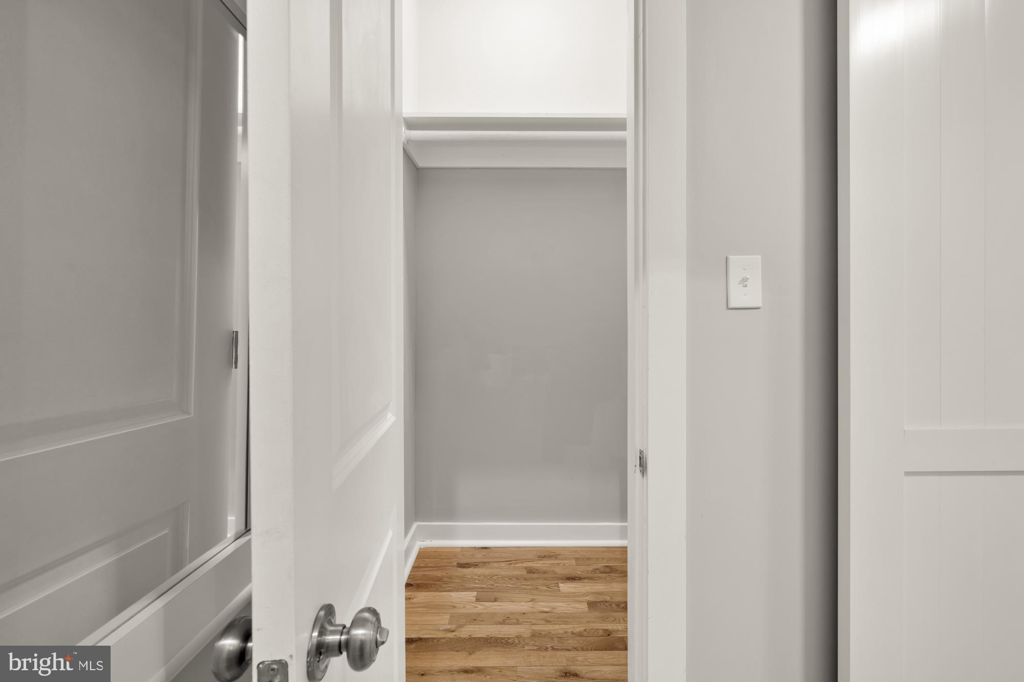 3529 14th Street Northwest, Unit 1 Washington, DC 20010 - Photo 12 of 14 a view of walk in closet with empty racks