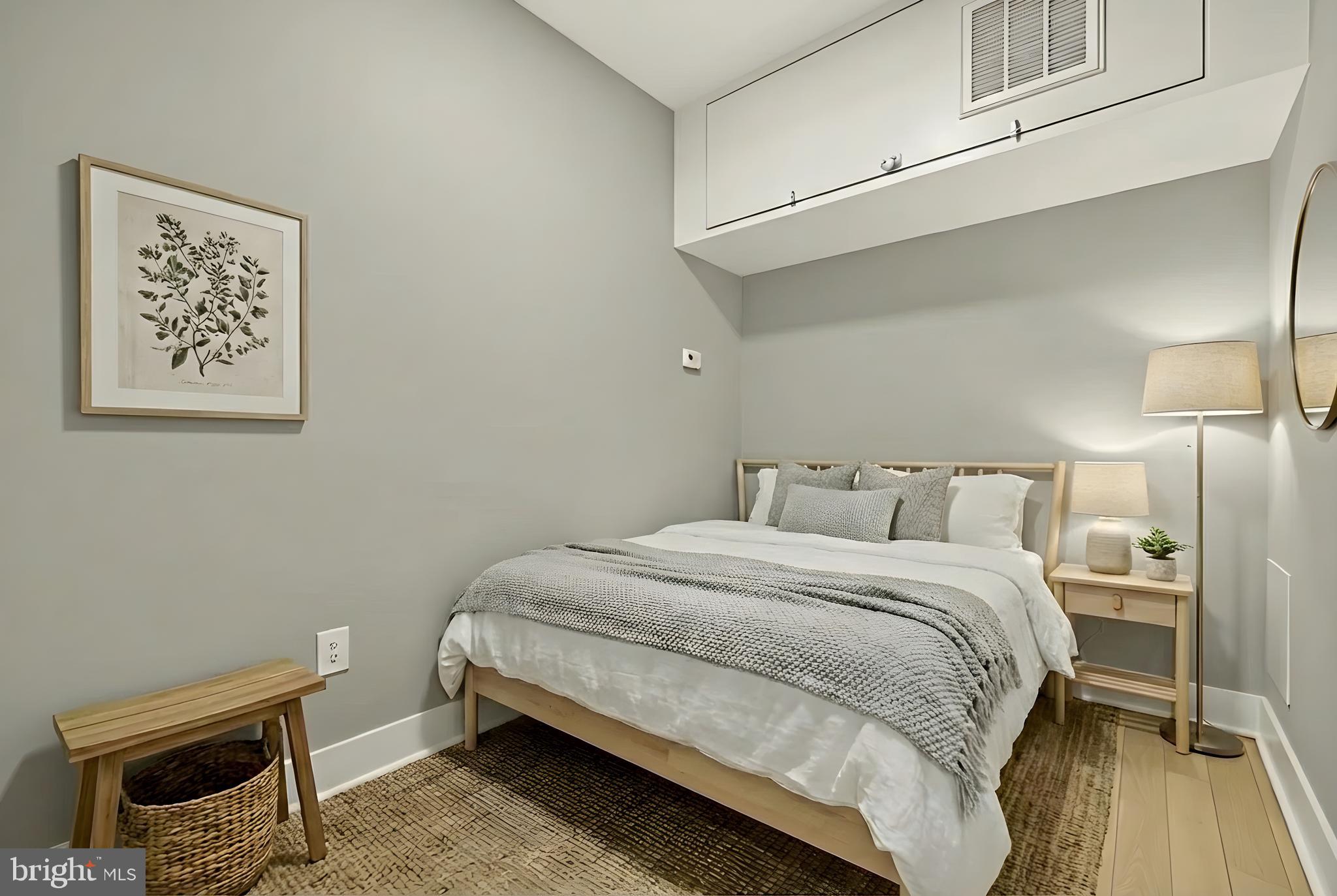3529 14th Street Northwest, Unit 1 Washington, DC 20010 - Photo 6 of 14 a bedroom with a bed and a window