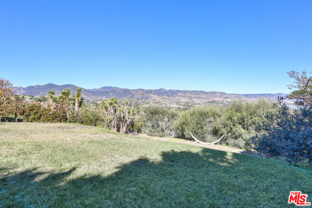 7050 Dume Drive Malibu, CA 90265 - Photo 11 of 13 a view of outdoor space and mountain view