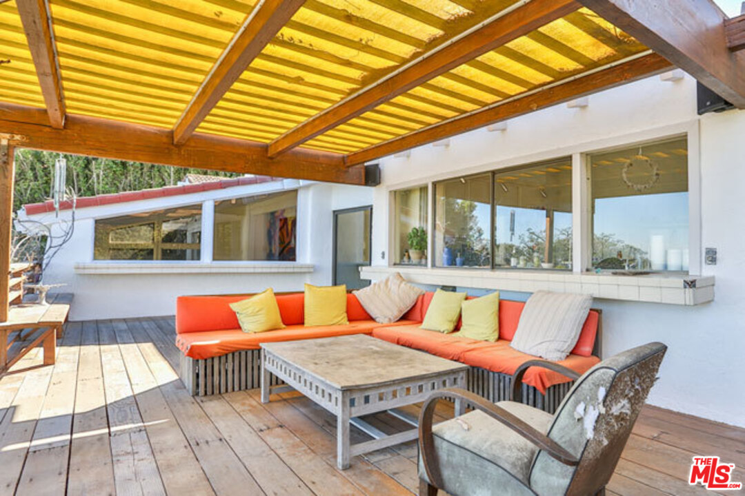 7050 Dume Drive Malibu, CA 90265 - Photo 10 of 13 a outdoor space with a patio