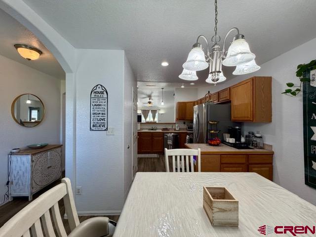 544 20th Street Delta, CO 81416 - Photo 8 of 44 a view of a kitchen and dining table