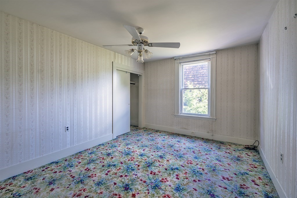 72 Rice Street, Unit 72 Cambridge, MA 02140 - Photo 11 of 20 a view of room with window and ceiling fan