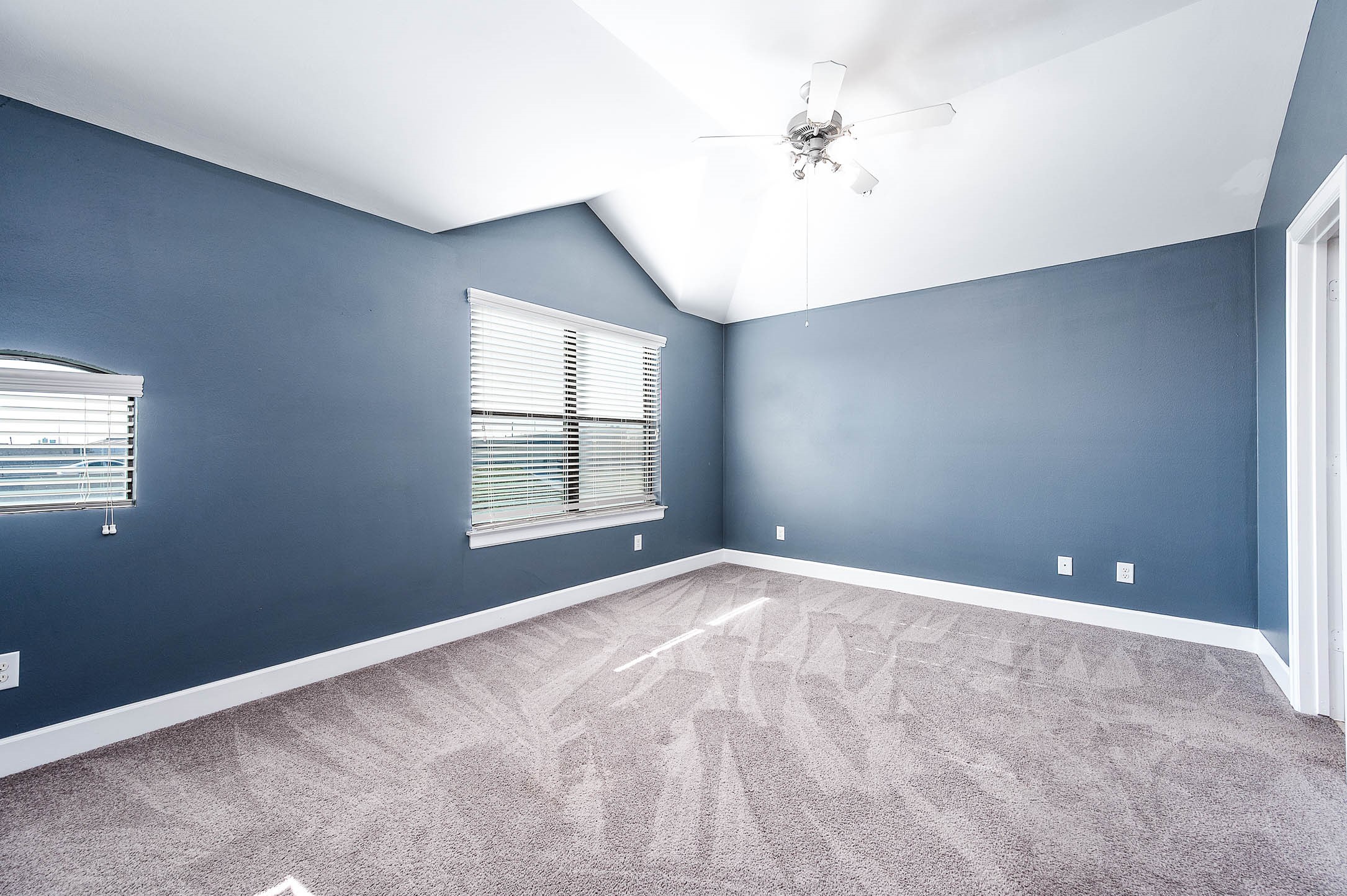 7650 Springhill Street, Unit 704 Houston, TX 77021 - Photo 16 of 23 wooden floor in an empty room with a window