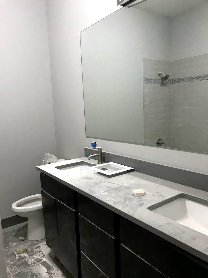 1432 West 21st Street, Unit 306 Chicago, IL 60608 - Photo 3 of 9 a bathroom with a sink and a toilet