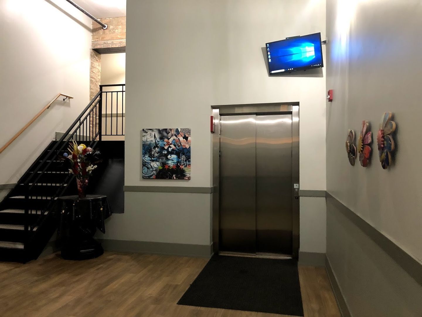 1432 West 21st Street, Unit 306 Chicago, IL 60608 - Photo 5 of 9 a view of entryway with wooden floor