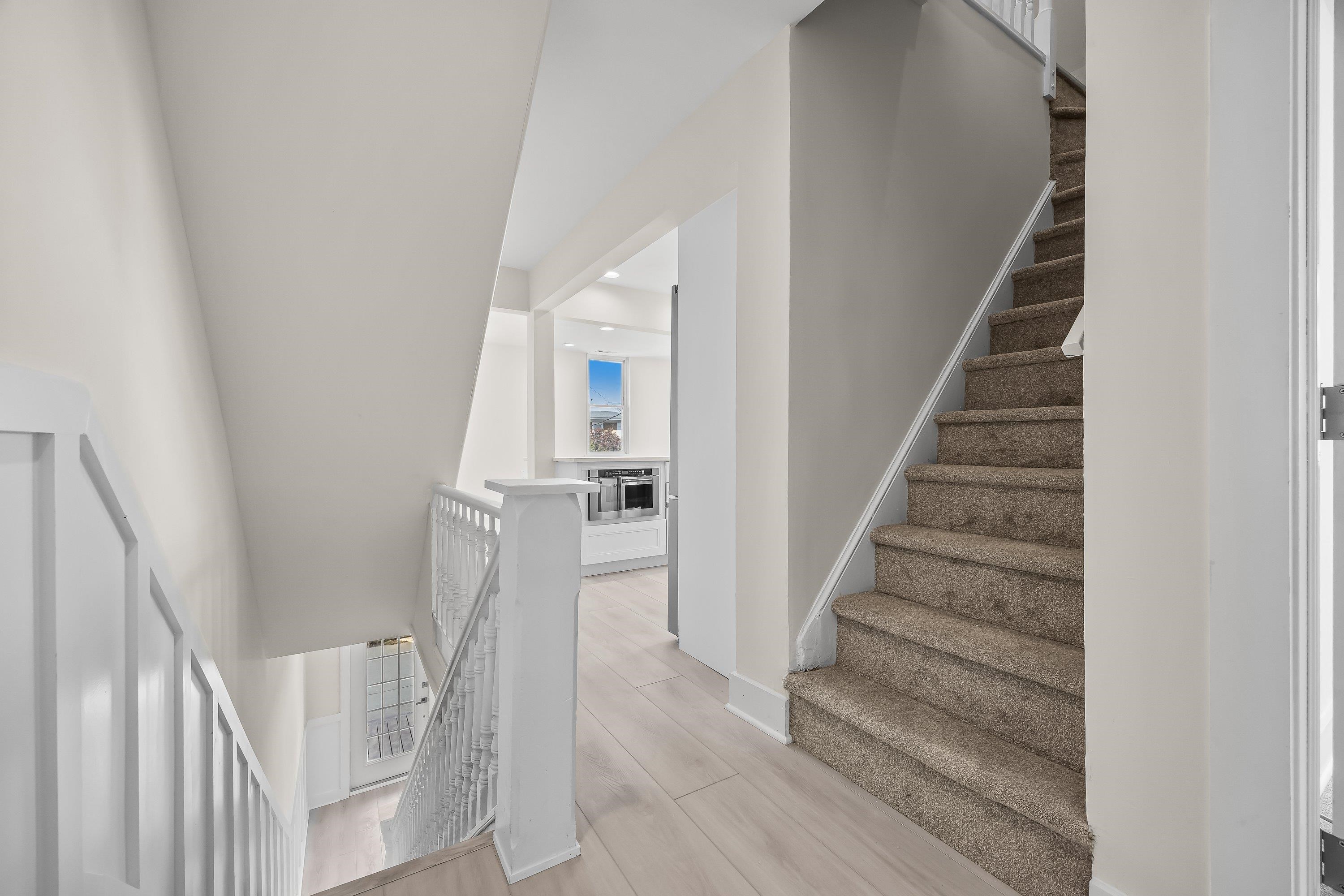 733 Wesley Road, Unit NORTH Ocean City, NJ 08226 - Photo 14 of 47 a view of entryway and hall with wooden floor