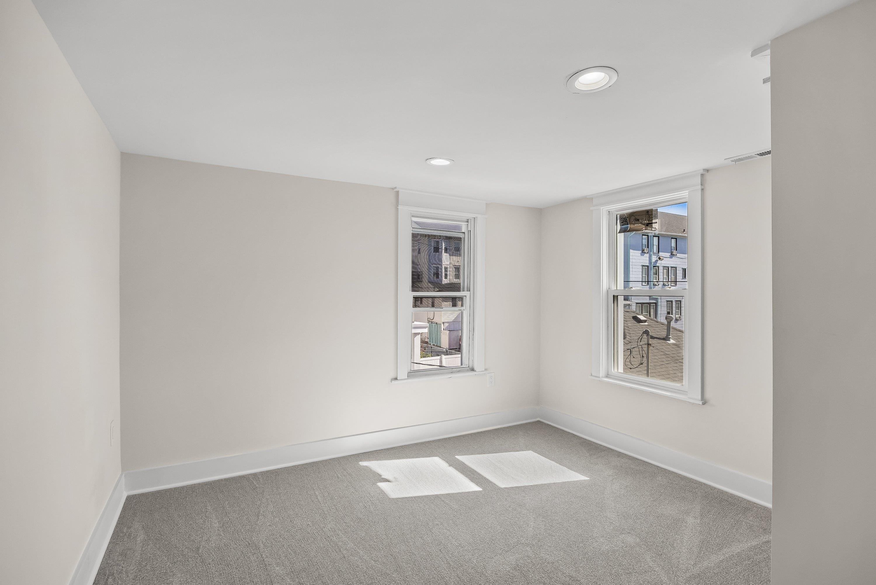 733 Wesley Road, Unit NORTH Ocean City, NJ 08226 - Photo 22 of 47 a view of an empty room with a window