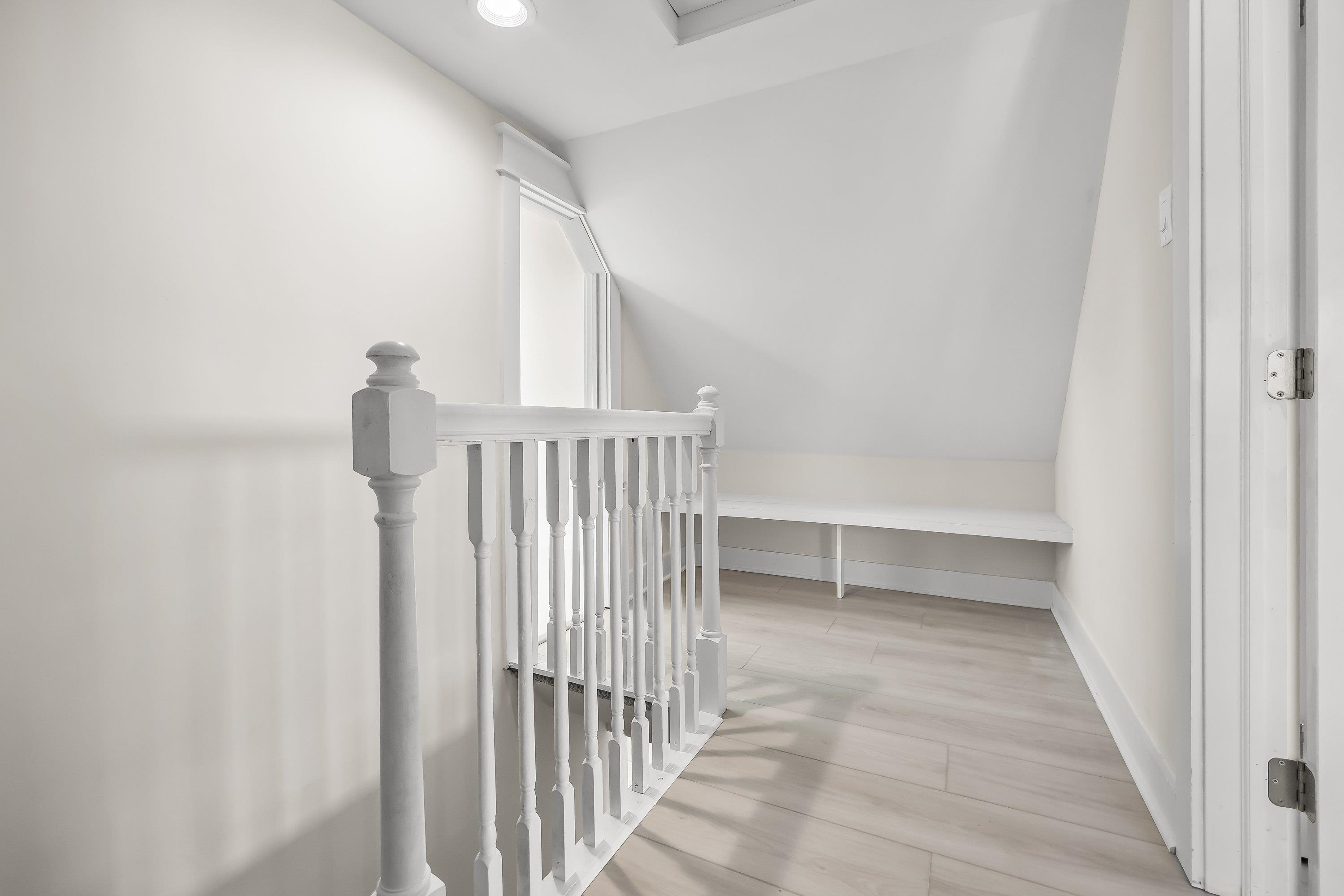 733 Wesley Road, Unit NORTH Ocean City, NJ 08226 - Photo 25 of 47 a view of a room with racks on the wall