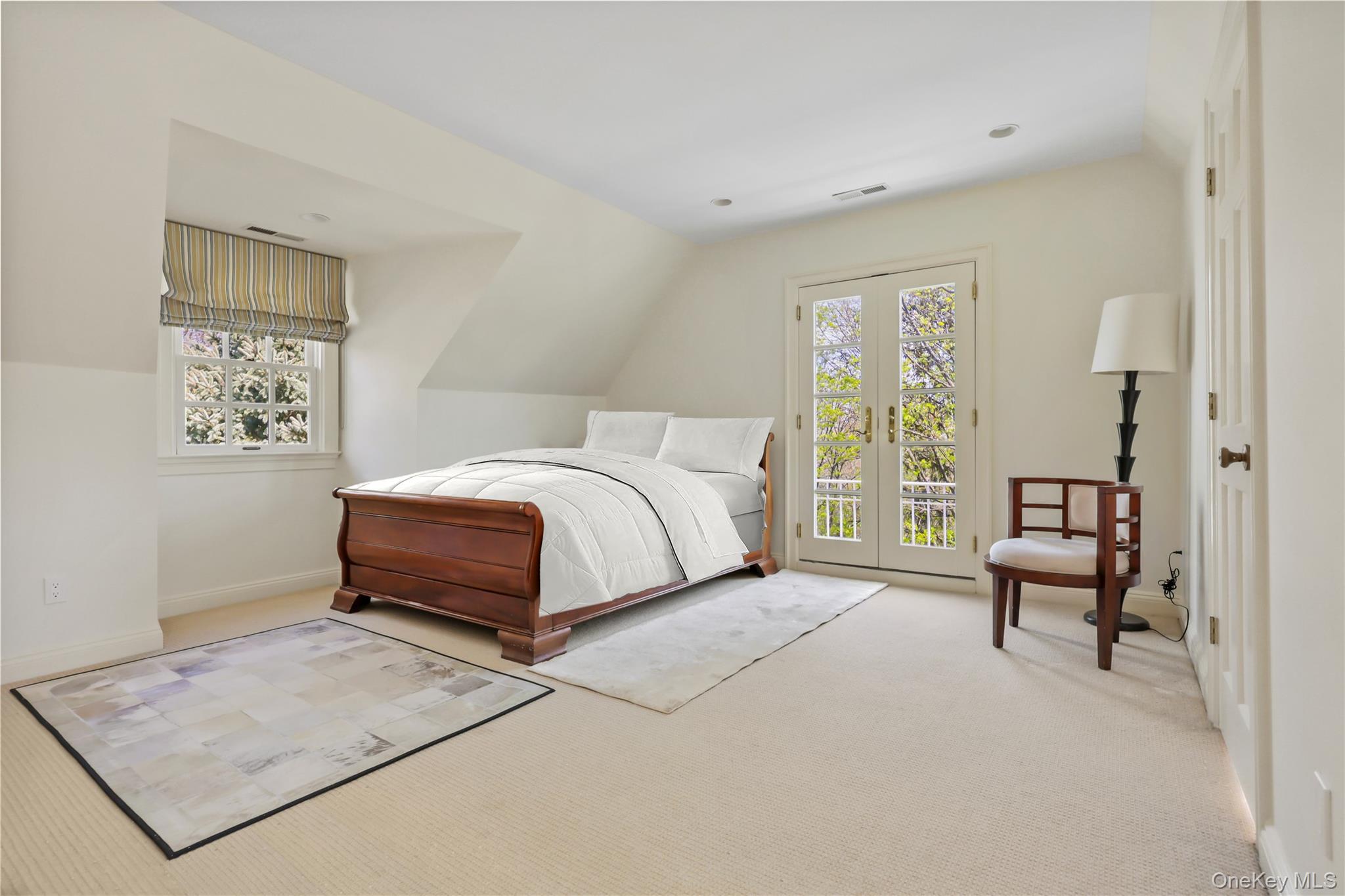 7 Plateau Circle West Bronxville, NY 10708 - Photo 24 of 34 a bedroom with a bed and a window