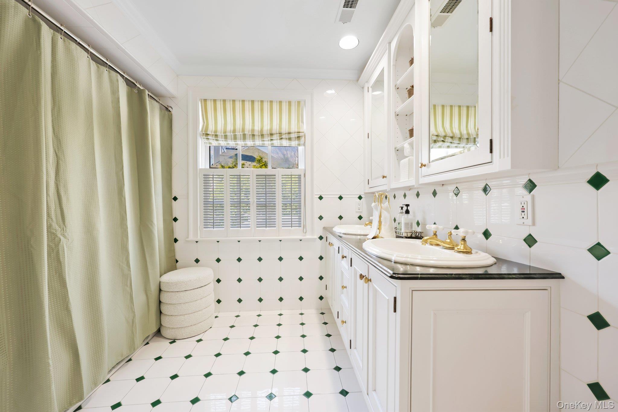 7 Plateau Circle West Bronxville, NY 10708 - Photo 25 of 34 a bathroom with a sink toilet a shower and a window