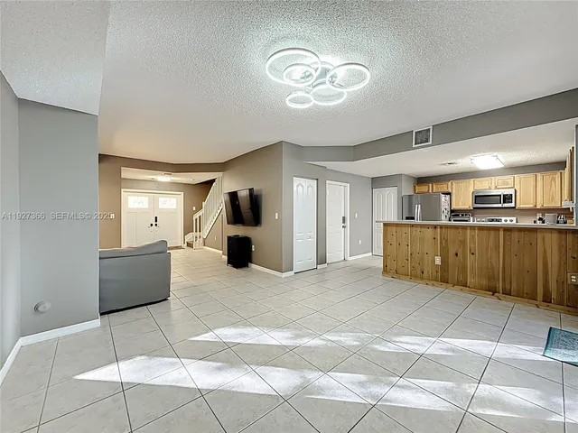a view of a livingroom with furniture