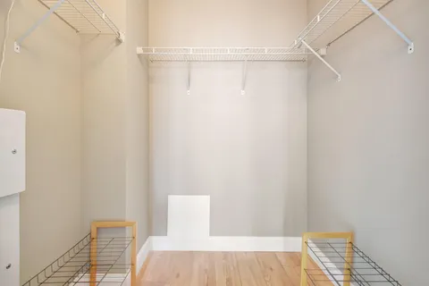 a living room with a bed and a couch