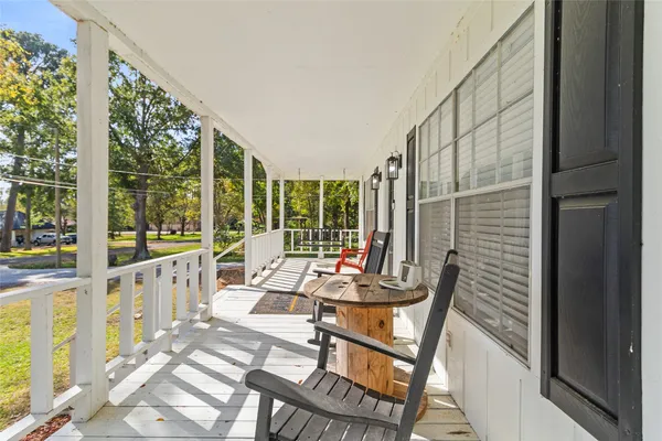 a living room with large windows