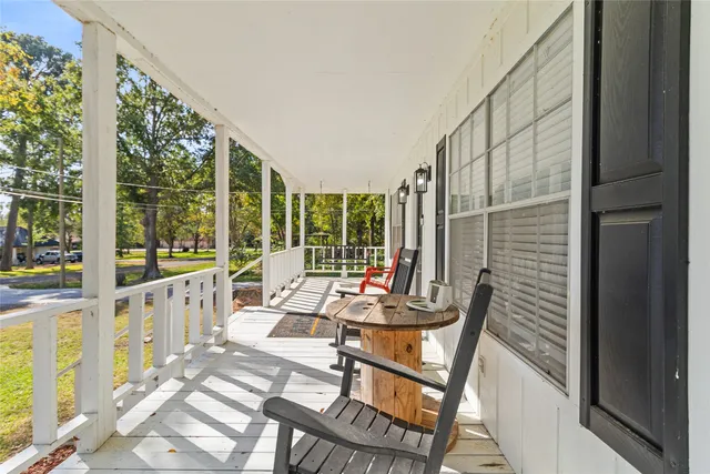 a living room with large windows