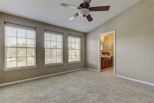 a bathroom with a sink double vanity granite and a mirror