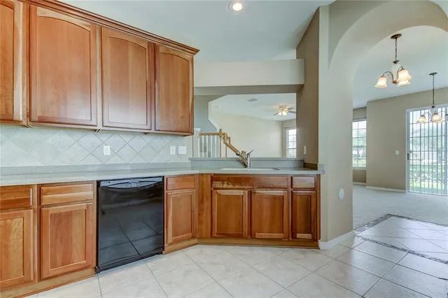 a view of a kitchen with cabinets