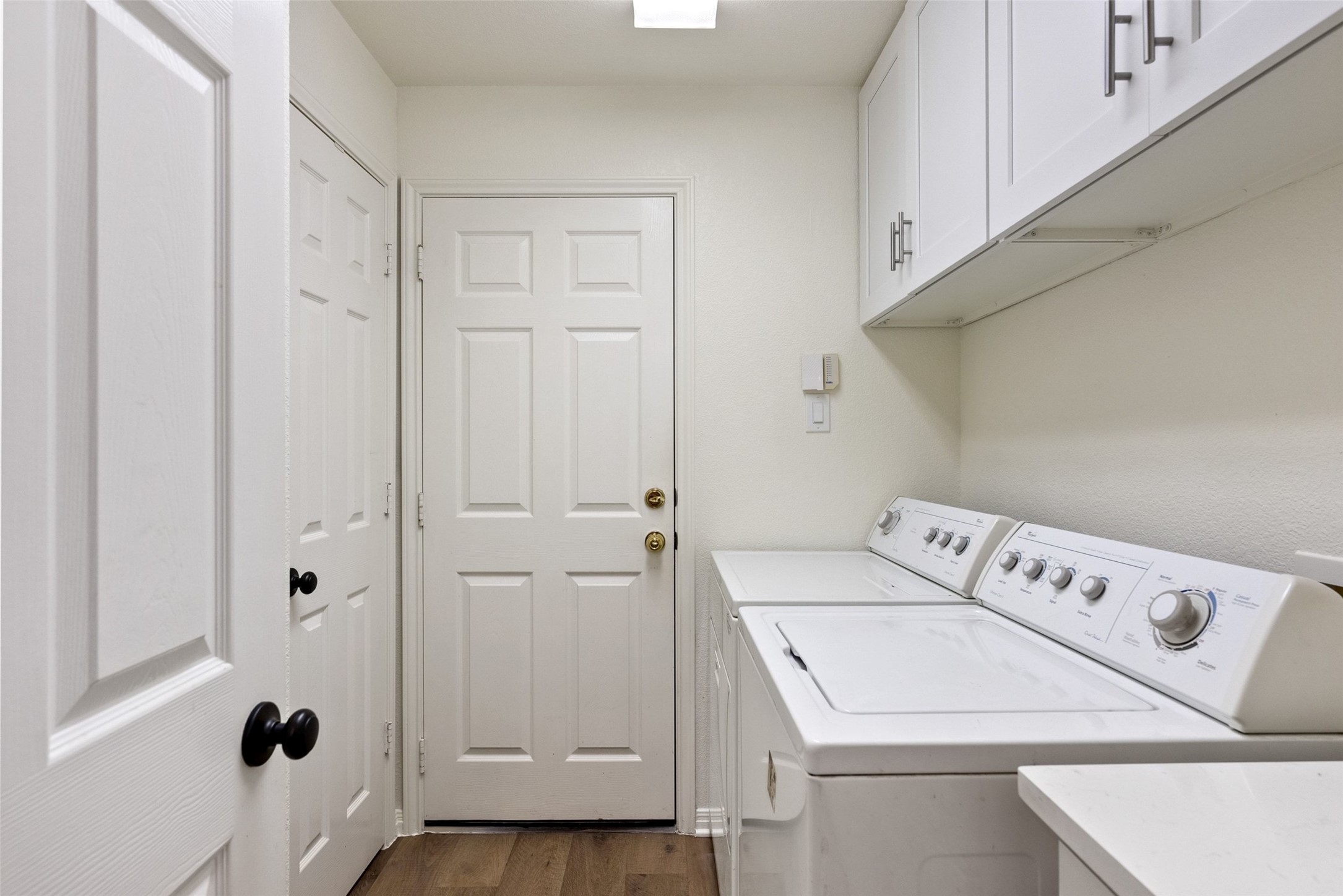 2950 Lantana Ridge Drive Austin, TX 78732 - Photo 13 of 40 a utility room with dryer and washer