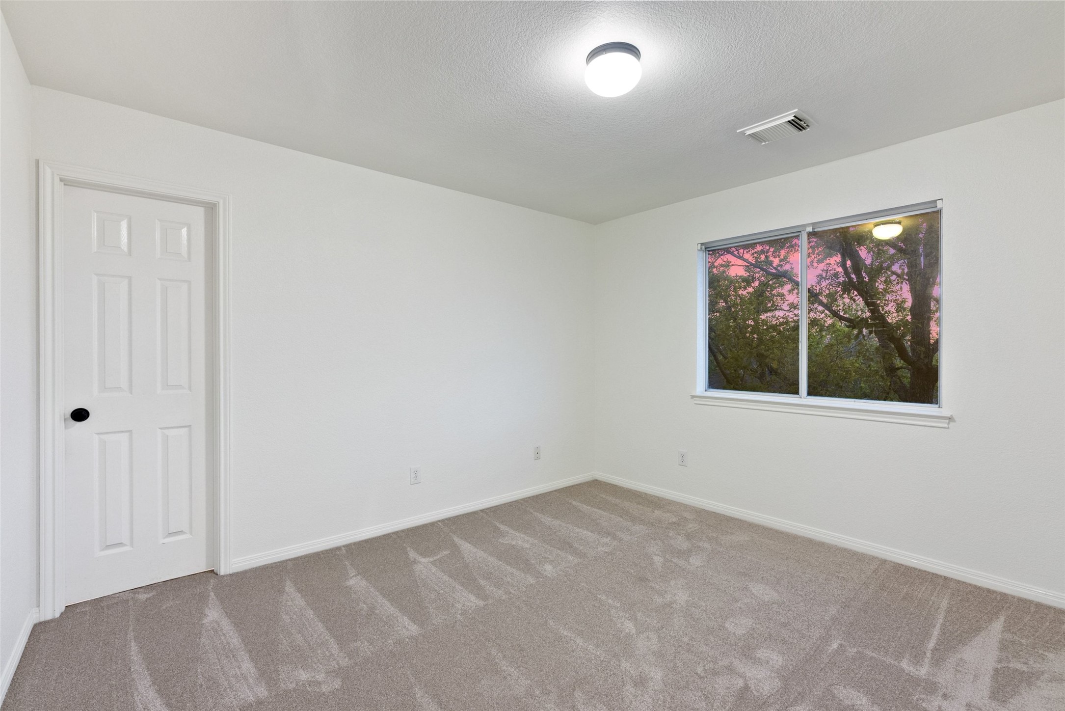 2950 Lantana Ridge Drive Austin, TX 78732 - Photo 16 of 40 a view of empty room with window