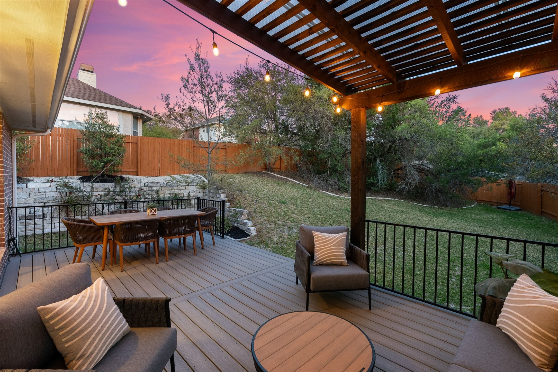 2950 Lantana Ridge Drive Austin, TX 78732 - Photo 21 of 40 a view of a patio with couches table and chairs