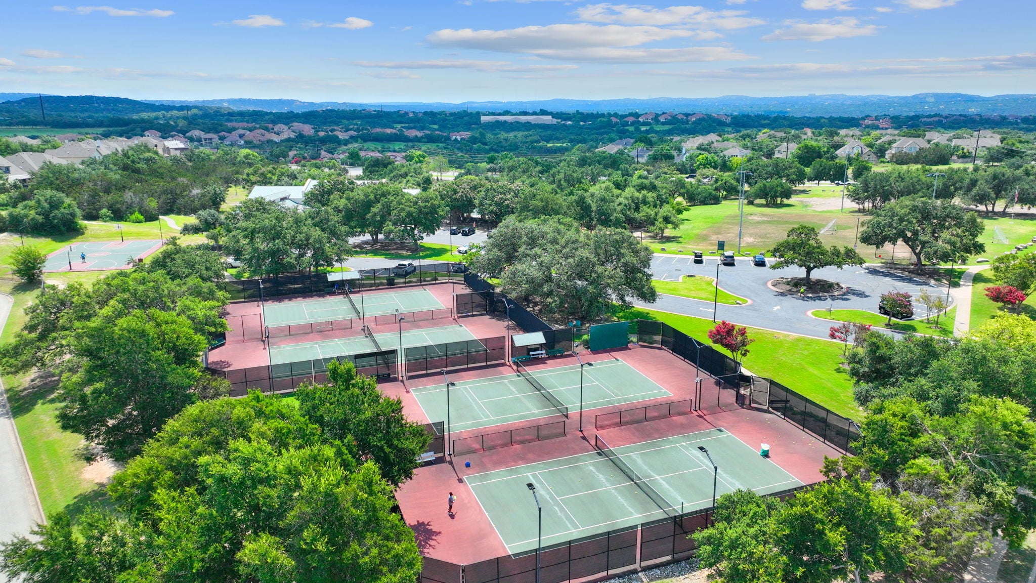 2950 Lantana Ridge Drive Austin, TX 78732 - Photo 27 of 40 an aerial view of a house with a garden