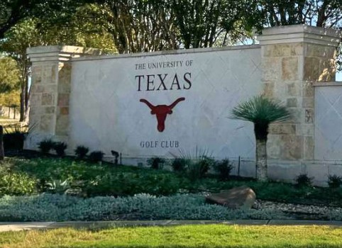 2950 Lantana Ridge Drive Austin, TX 78732 - Photo 34 of 40 a sign that is sitting on a brick wall